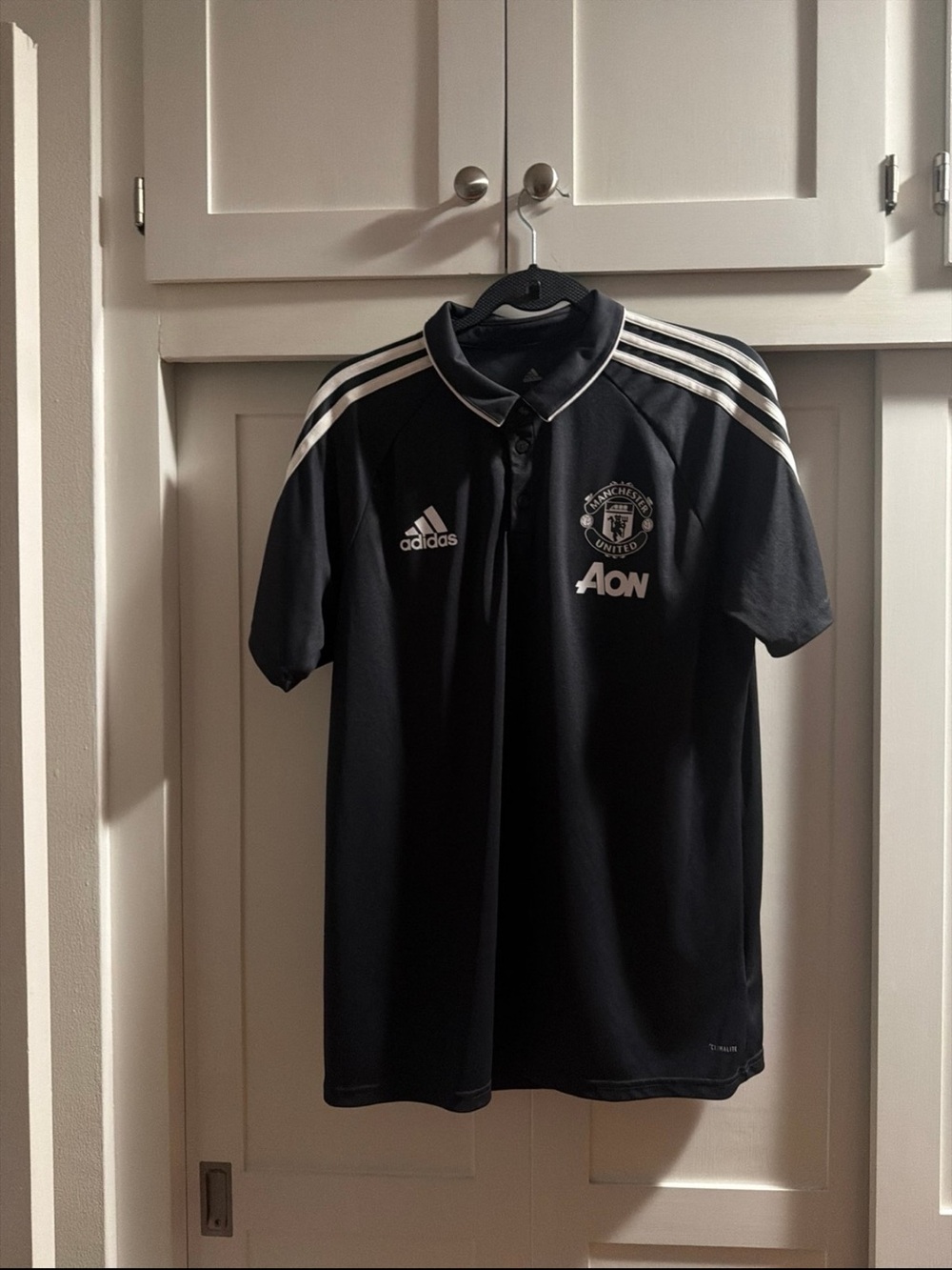 adidas Black Manchester United Training Polo with White Stripes